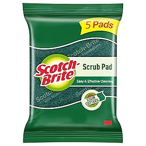 Scrub pad utensil cleaner